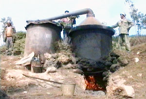 Distillation has been completed, workers prepare to discharge