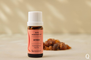 Myrrh Essential Oil stood next to the raw material